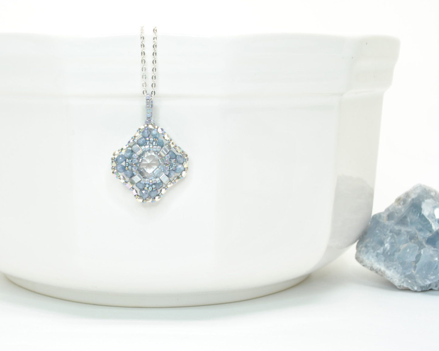 light blue and clear cushion cut crystal pendant necklace . #028