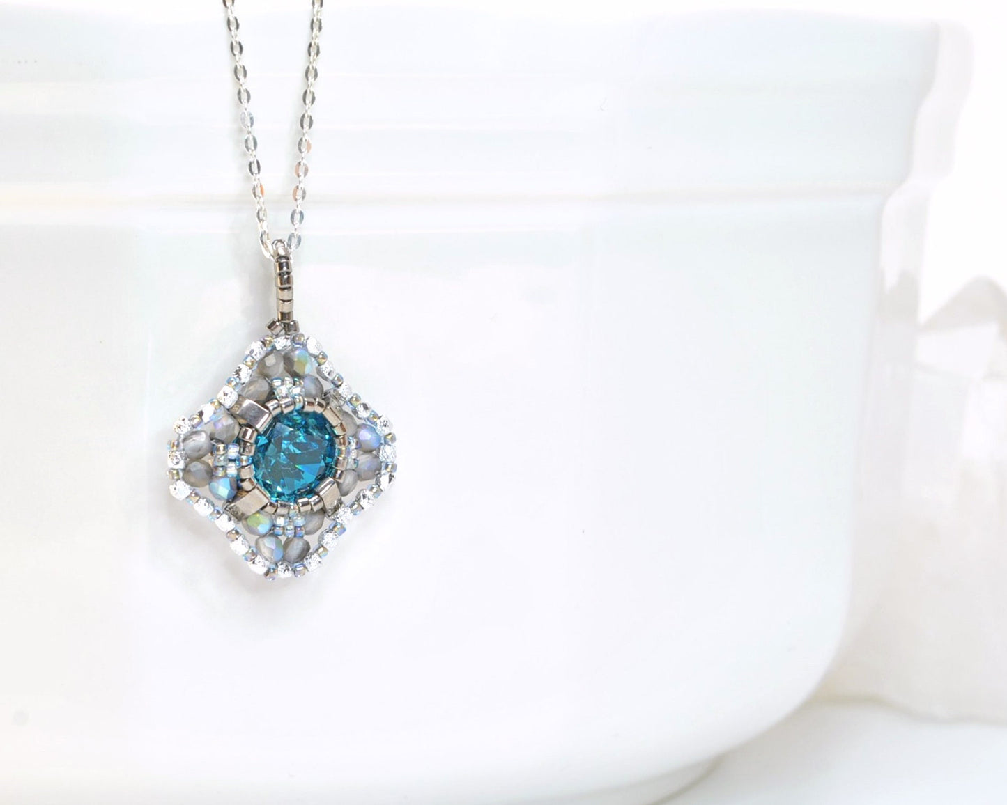 teal and silver swarovski crystal cushion cut pendant . #010
