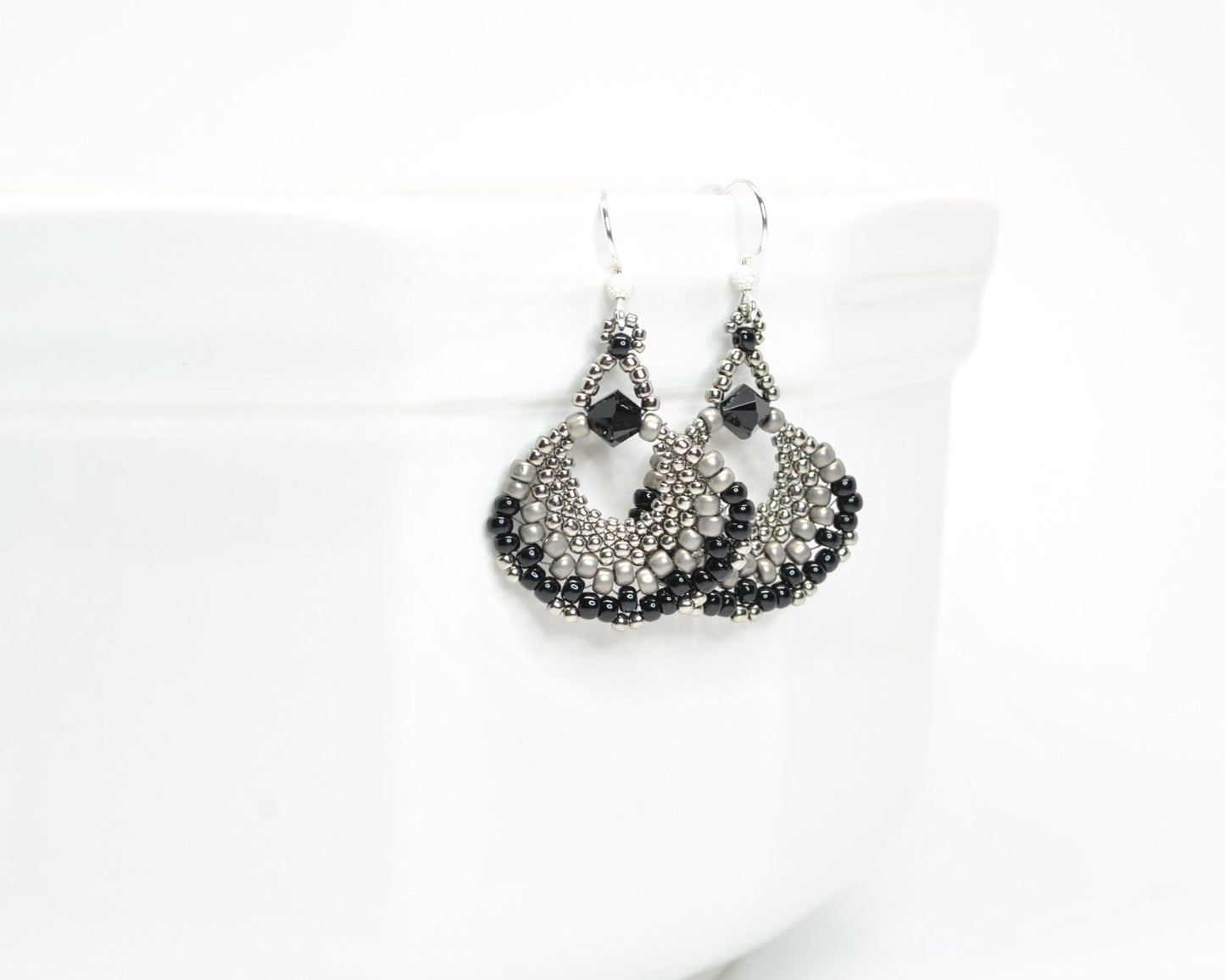 black and silver statement fan earrings