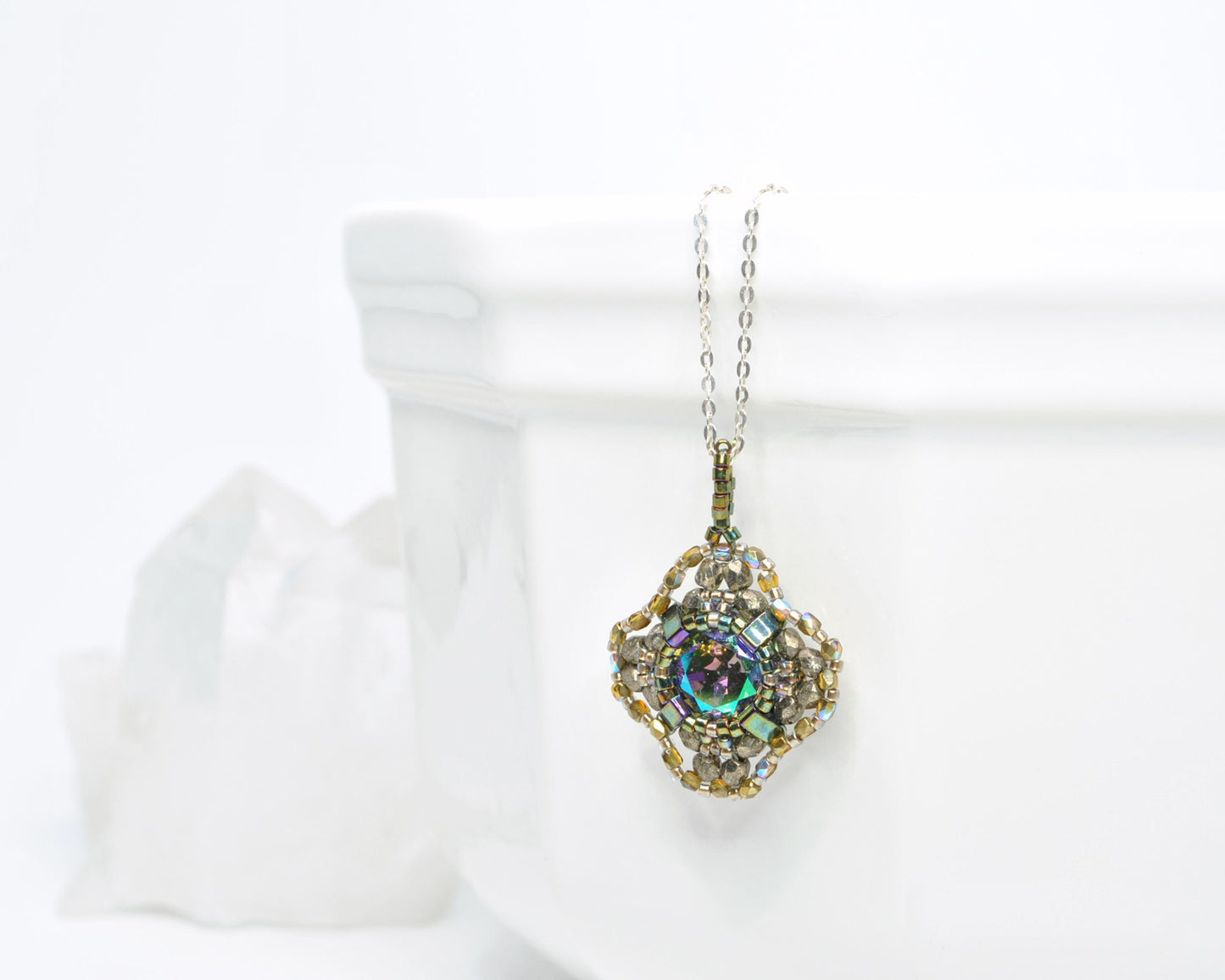 purple green and gold swarovski crystal cushion cut beaded pendant . #005