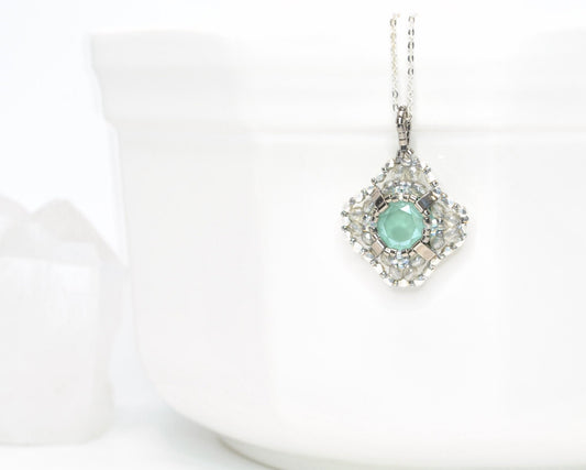 mint green and silver swarovski crystal cushion cut pendant . #034