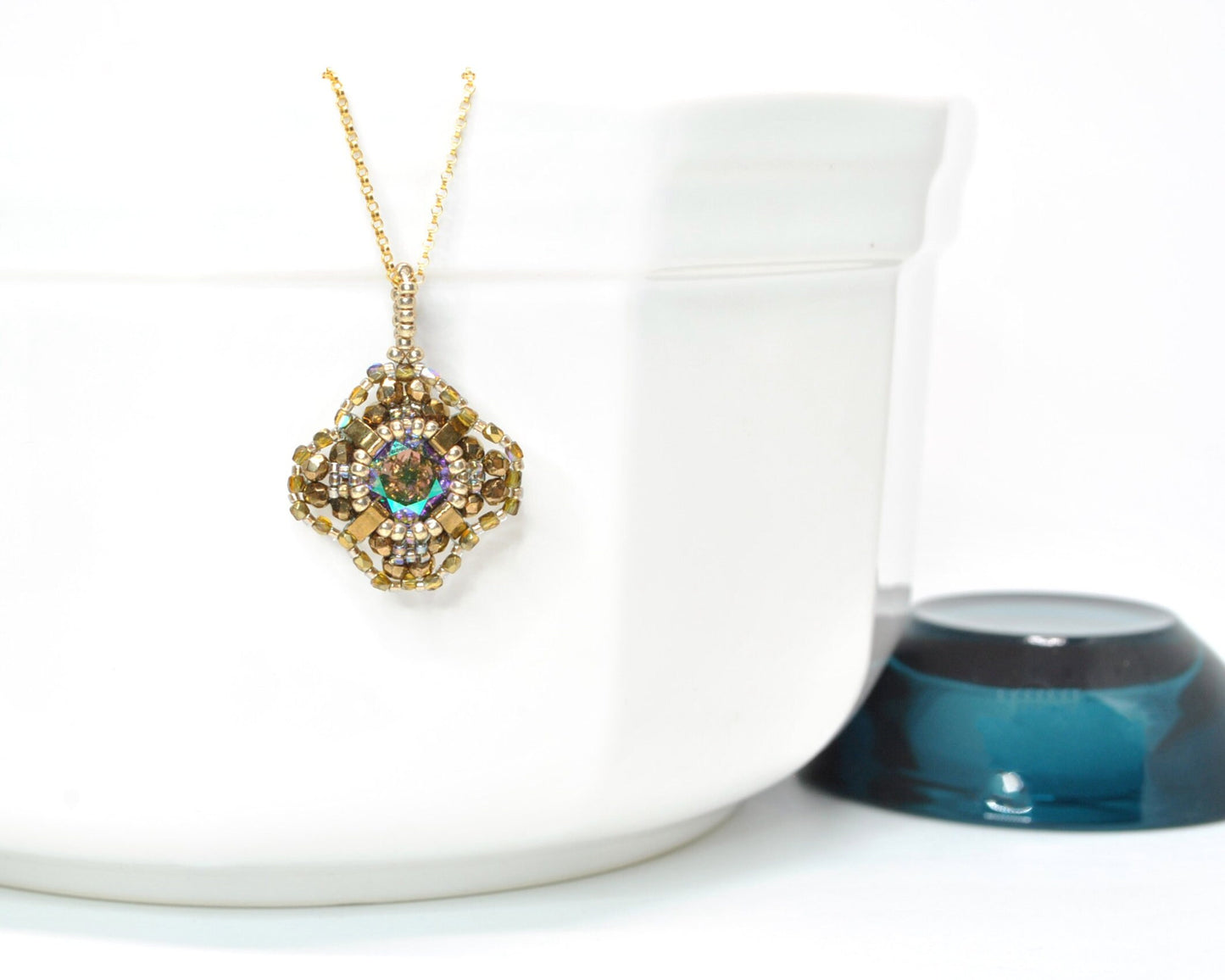 gold and iridescent swarovski crystal cushion cut pendant necklace . #014
