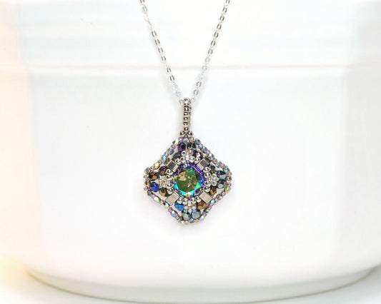 metallic purple swarovski crystal pendant . #004