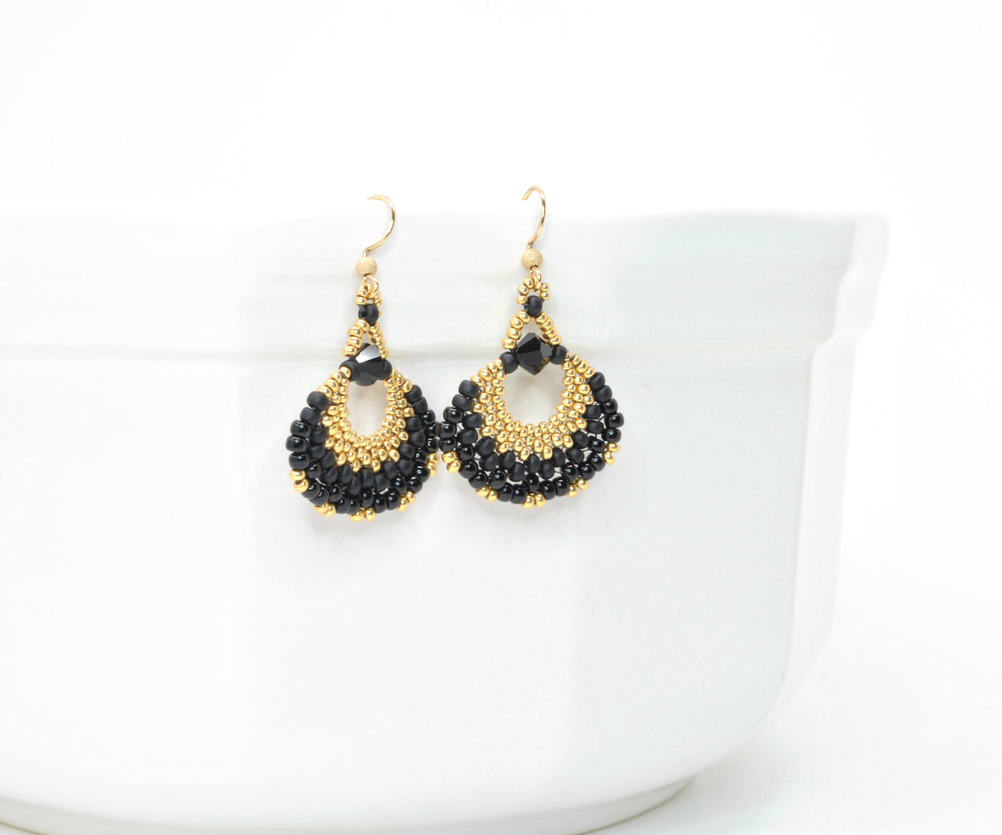 gold and black fan earrings