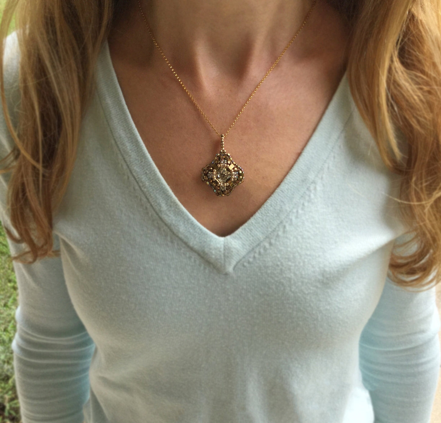 pink and iridescent green-gray swarovski crystal cushion cut pendant necklace . #013