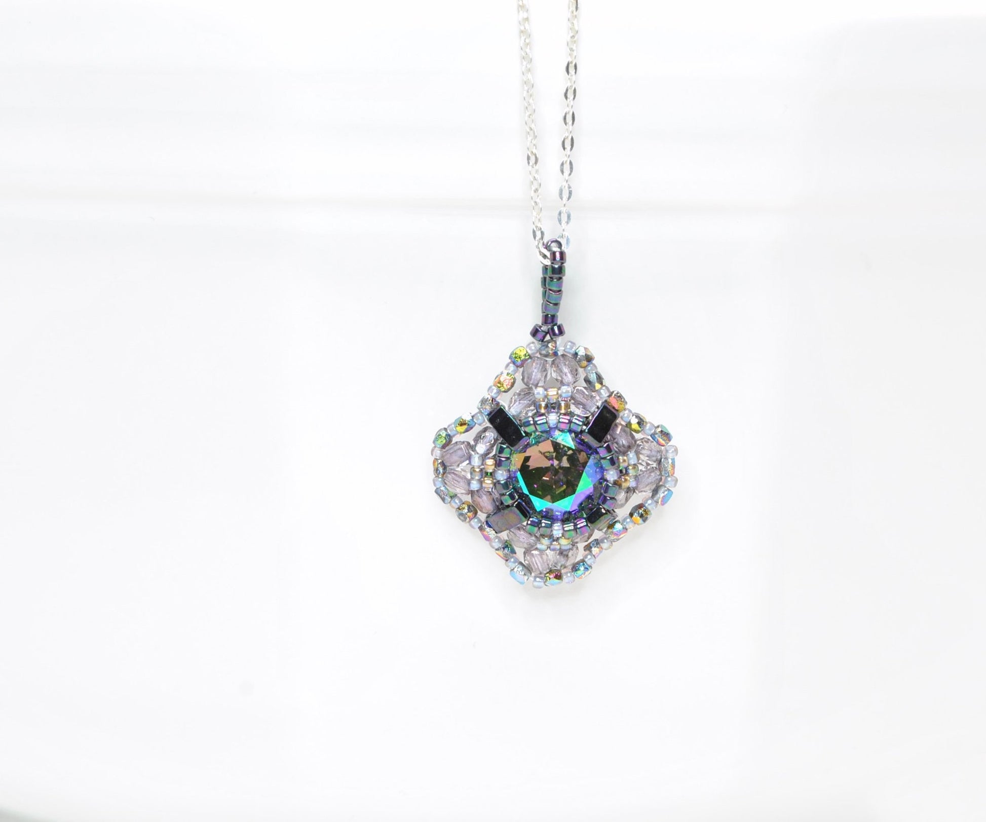 iridescent iris swarovski crystal cushion cut pendant necklace . statement necklace . unique crystal necklace . #015