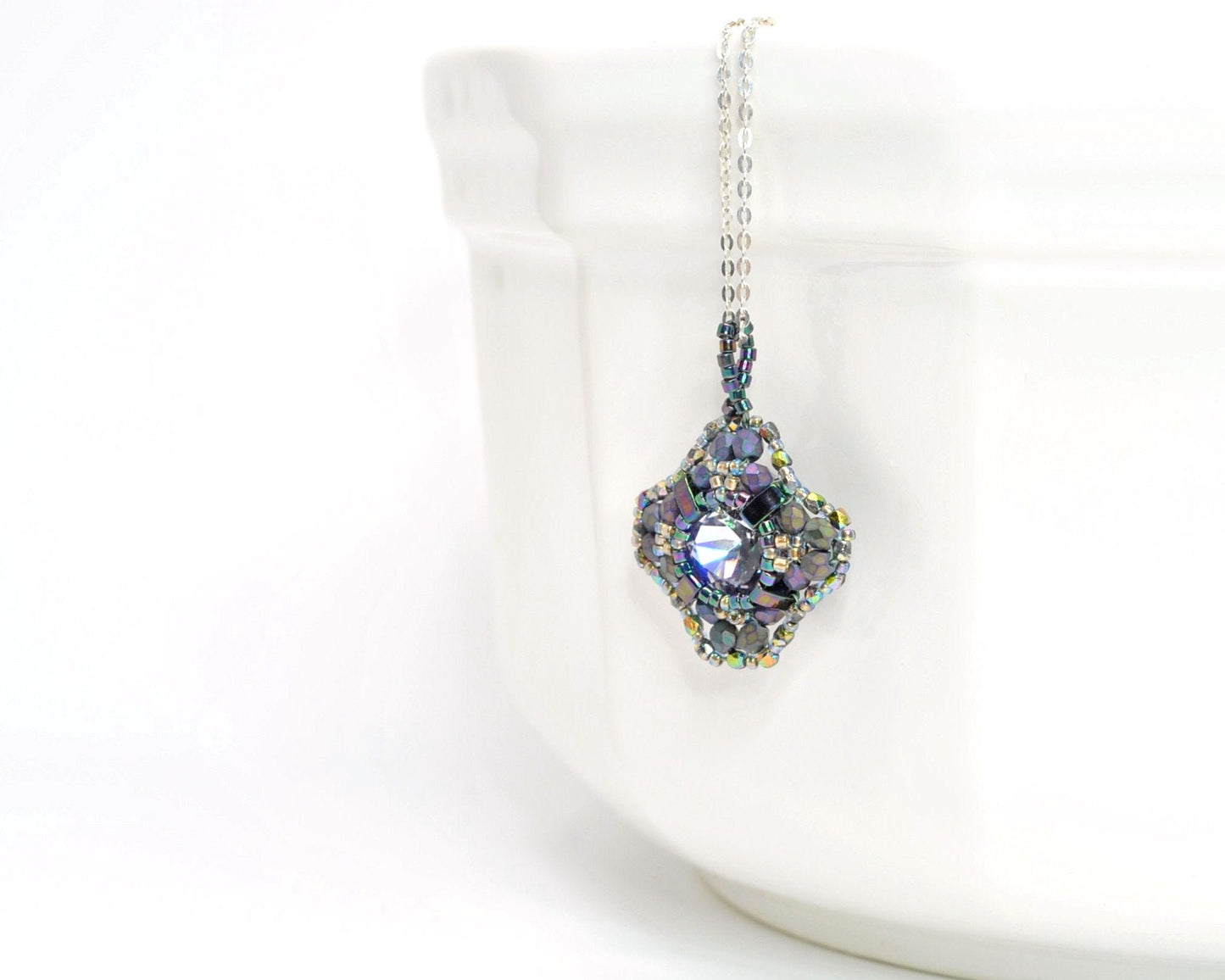 purple metallic swarovski cushion cut pendant .  #021