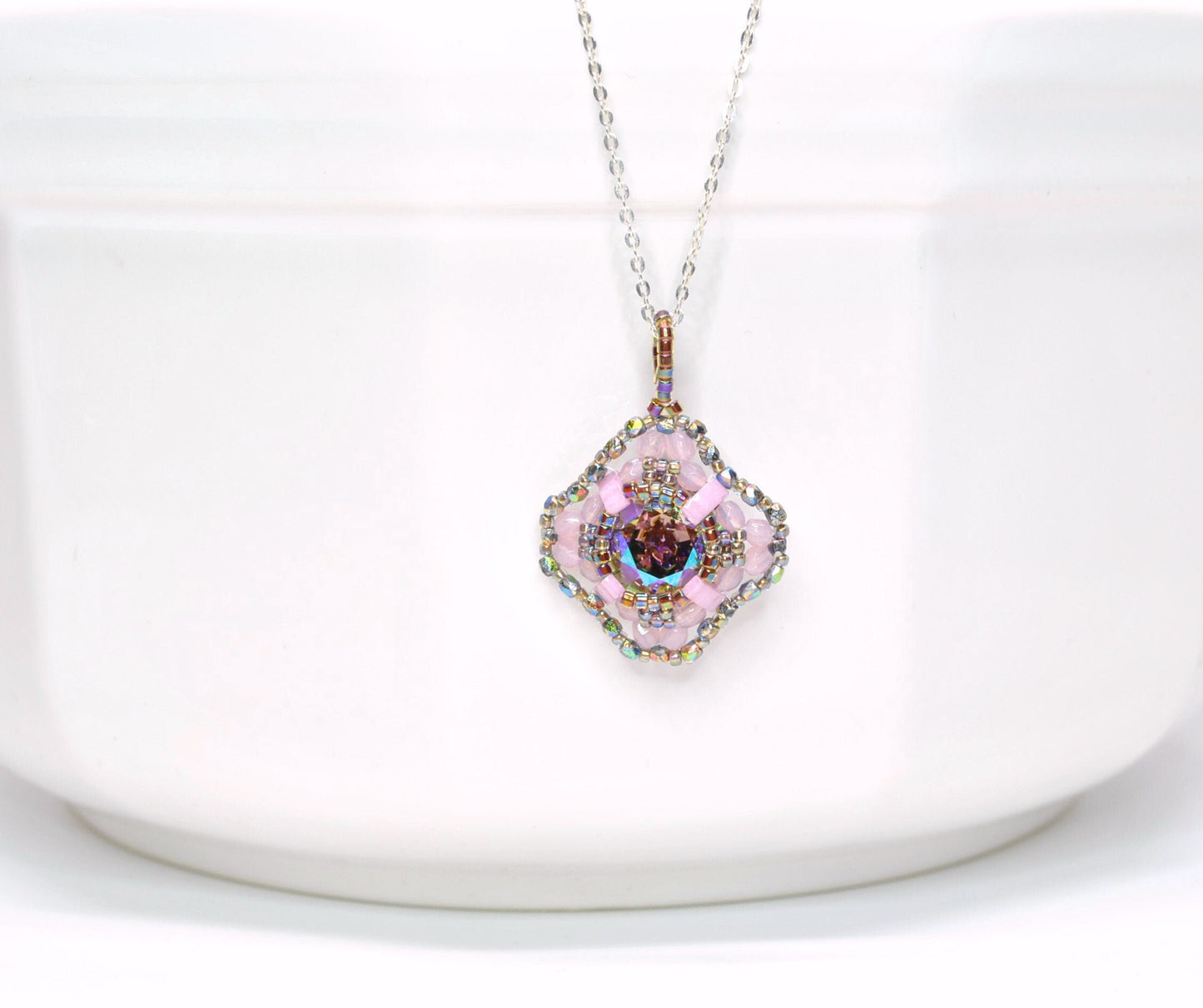 pink and iridescent green-gray swarovski crystal cushion cut pendant necklace . #013