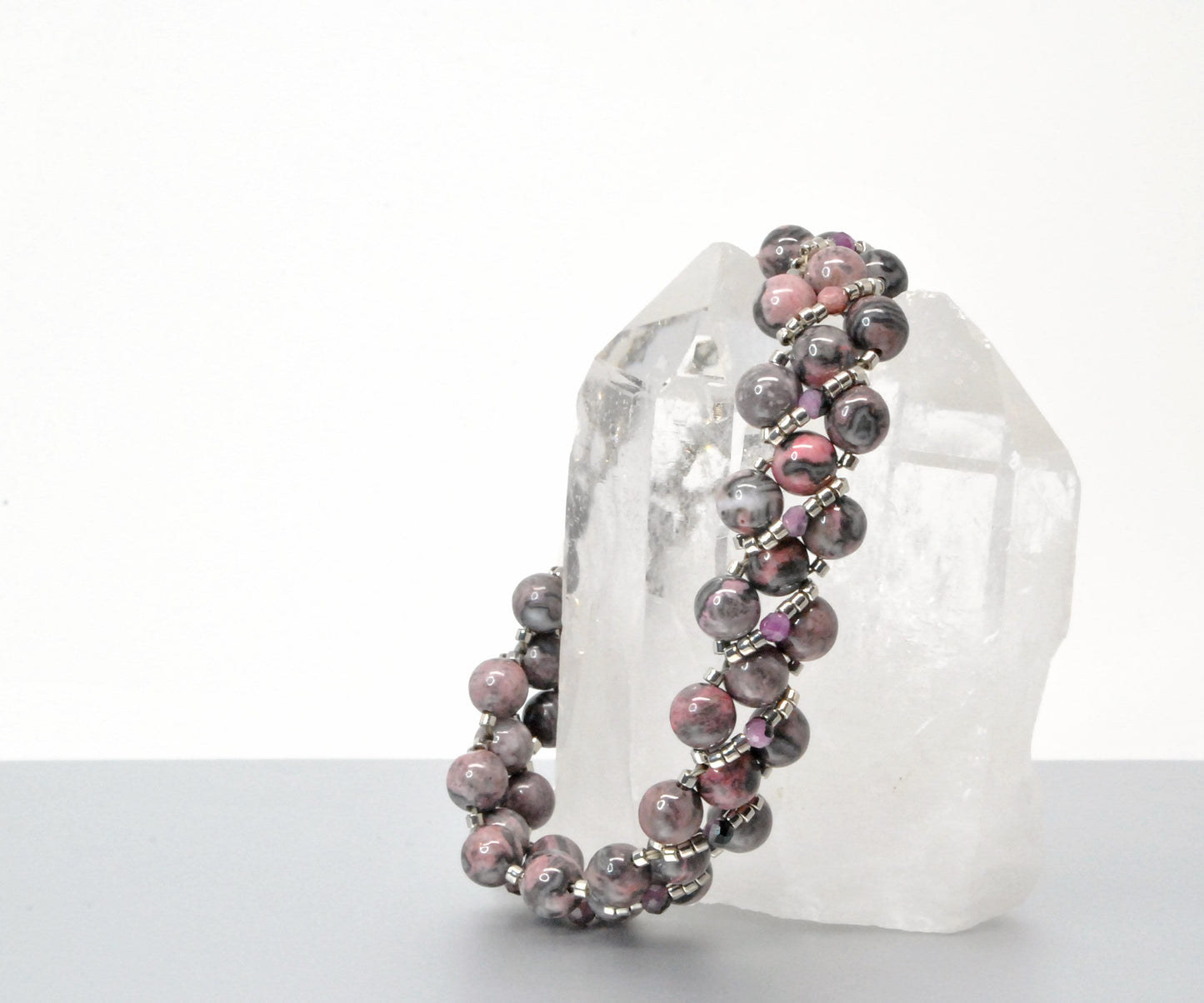 rhodonite and black lace ruby beaded bracelet . pink and black bracelet .