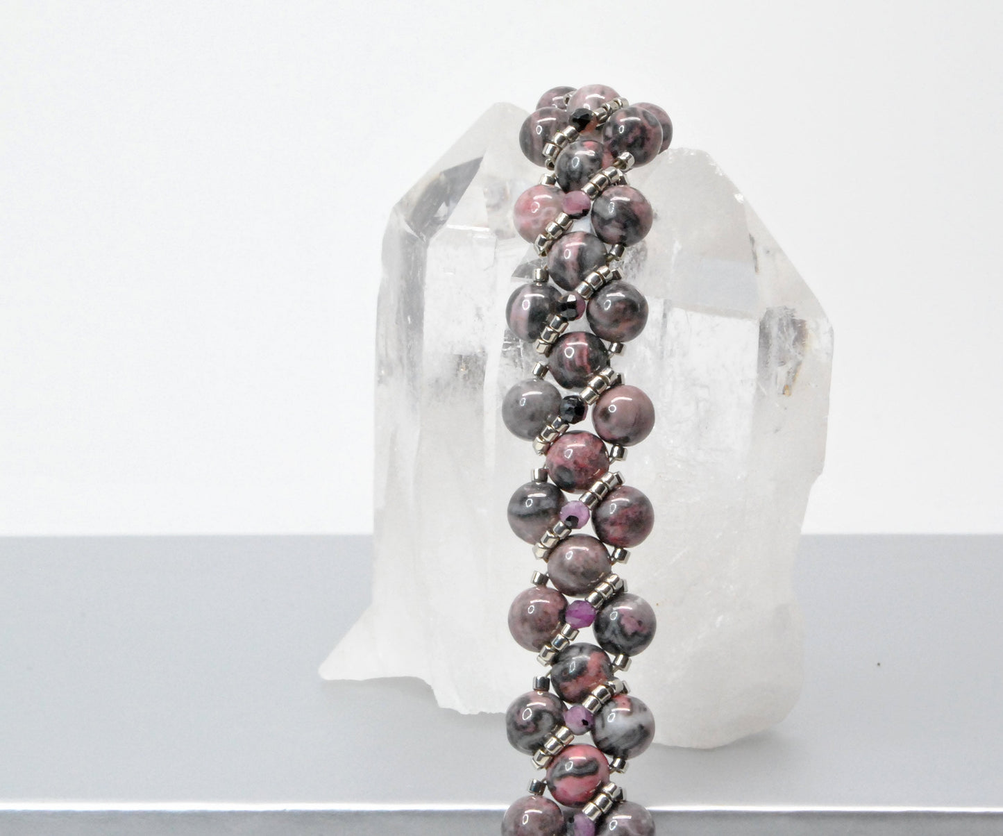 rhodonite and black lace ruby beaded bracelet . pink and black bracelet .