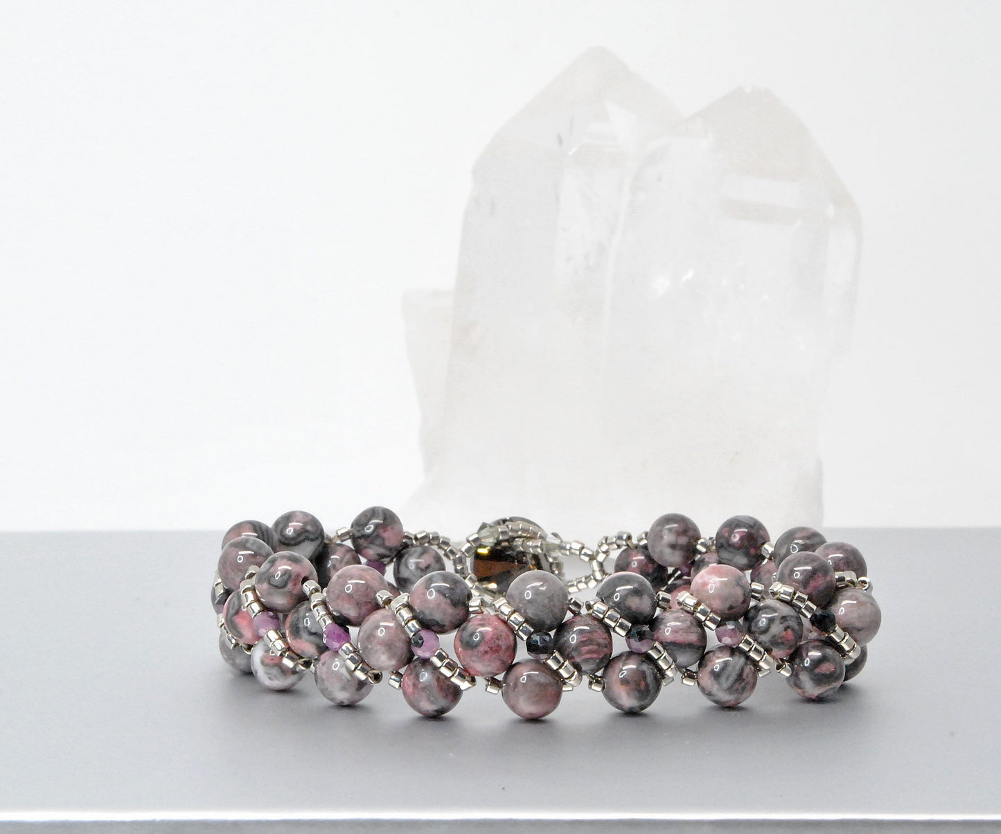 rhodonite and black lace ruby beaded bracelet . pink and black bracelet .