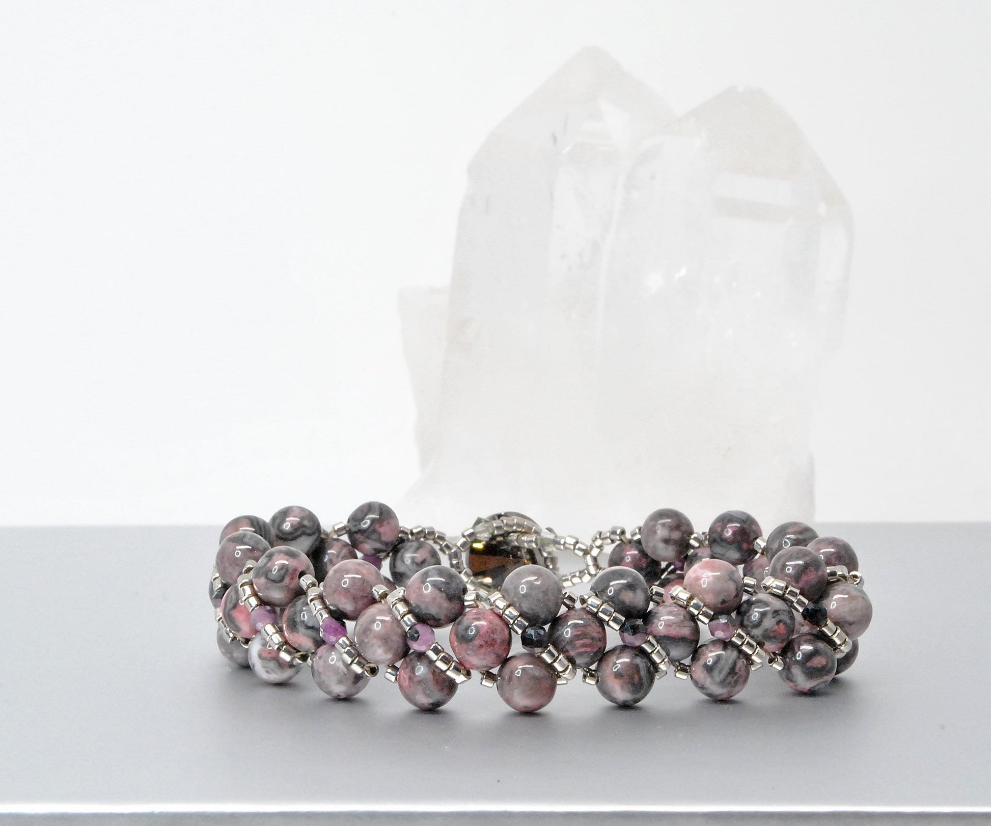 rhodonite and black lace ruby beaded bracelet . pink and black bracelet .