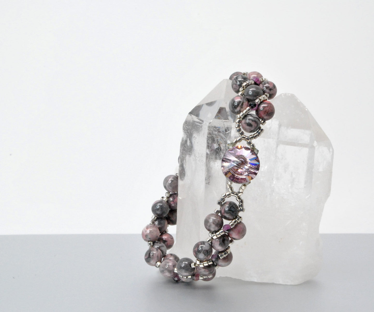 rhodonite and black lace ruby beaded bracelet . pink and black bracelet .