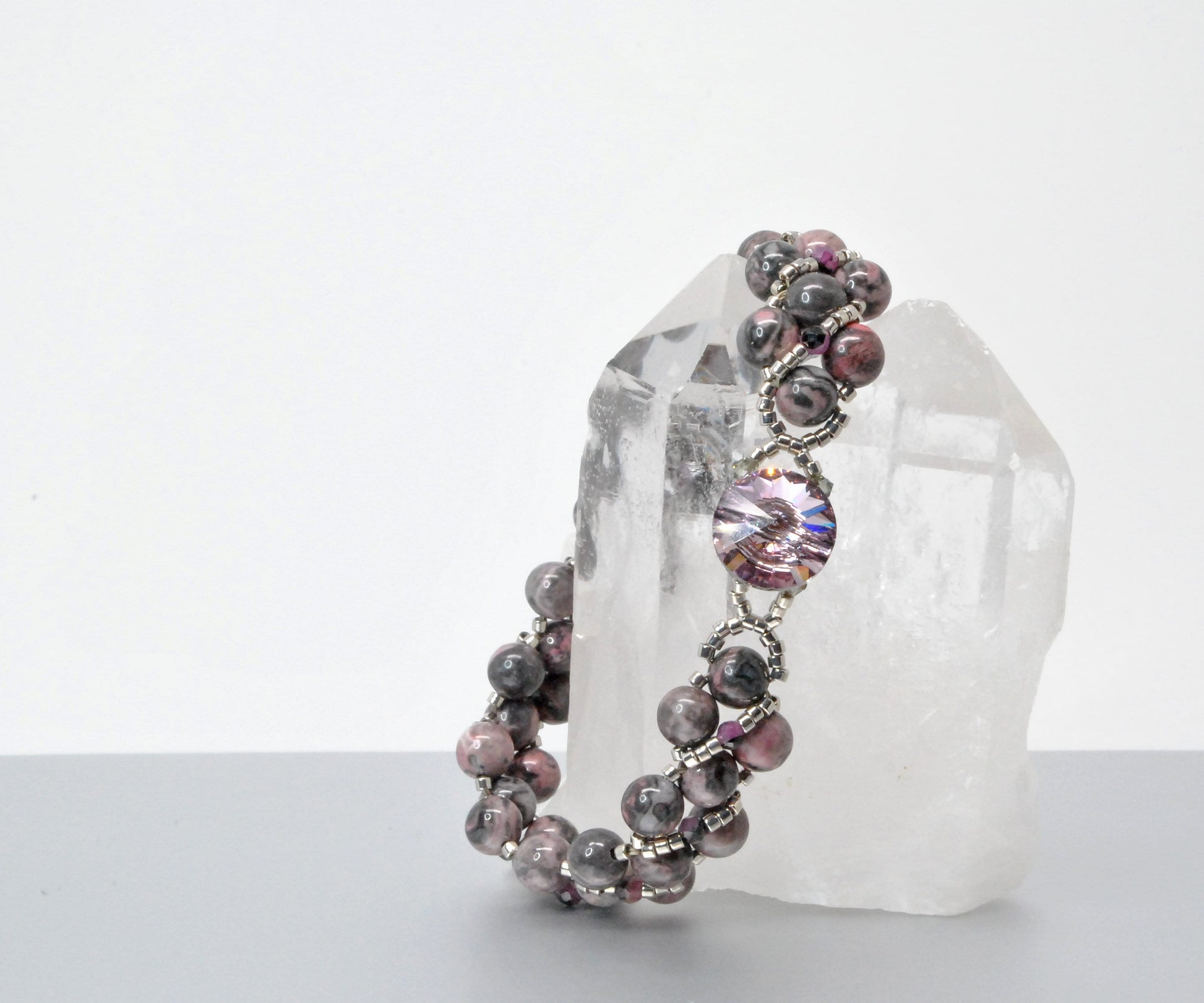 rhodonite and black lace ruby beaded bracelet . pink and black bracelet .